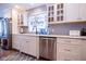 Bright kitchen featuring stainless steel appliances, granite countertops, and white cabinets at 5964 Laramie Trl, Columbus, IN 47203