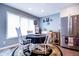 Bright eat-in kitchen with stainless steel appliances and a round dining table with a floral rug at 5964 Laramie Trl, Columbus, IN 47203