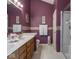 Bathroom features double vanity sinks and a walk-in shower at 7119 Topp Creek Ct, Indianapolis, IN 46214