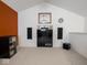 Well-lit game room with an entertainment center and integrated speakers, perfect for Gathering entertainment at 7119 Topp Creek Ct, Indianapolis, IN 46214