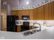 The modern kitchen boasts sleek appliances, bright countertops, and ample cabinet space for culinary enthusiasts at 7119 Topp Creek Ct, Indianapolis, IN 46214