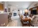 The inviting living room offers a cozy fireplace, comfortable seating, and seamless flow to the kitchen at 7119 Topp Creek Ct, Indianapolis, IN 46214