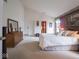 Spacious main bedroom featuring vaulted ceilings, carpet and an en suite bathroom at 7119 Topp Creek Ct, Indianapolis, IN 46214