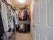 Walk in closet with metal shelving and a carpeted floor at 7119 Topp Creek Ct, Indianapolis, IN 46214