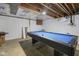Unfinished basement with a pool table and white painted walls at 236 Bixler Rd, Indianapolis, IN 46227
