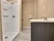 Bathroom with shower, vanity, and grey flooring at 1011 S Elm St, Muncie, IN 47302