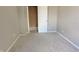 Cozy bedroom with neutral walls and carpet at 1011 S Elm St, Muncie, IN 47302