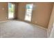Bright bedroom featuring two large windows at 1011 S Elm St, Muncie, IN 47302