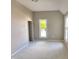 Bright bedroom featuring a window and closet at 1011 S Elm St, Muncie, IN 47302
