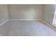 Simple bedroom with neutral walls and carpet at 1011 S Elm St, Muncie, IN 47302