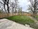 Spacious fenced backyard showcasing a well-maintained lawn and patio at 2869 Stuart St, Indianapolis, IN 46218