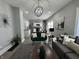 Inviting living room featuring modern decor and ample natural light, transitioning to dining and kitchen at 2869 Stuart St, Indianapolis, IN 46218