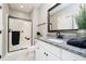 Updated bathroom with a shower, granite vanity, and stylish decor at 13668 Cheswick Blvd, Carmel, IN 46032