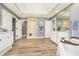 Spacious bathroom features a walk-in shower, double vanity, and white cabinets at 13668 Cheswick Blvd, Carmel, IN 46032