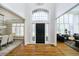 Elegant foyer featuring high ceilings, hardwood floors, and a grand entryway at 13668 Cheswick Blvd, Carmel, IN 46032