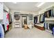 Large walk-in closet with custom shelving and storage space at 13668 Cheswick Blvd, Carmel, IN 46032