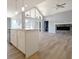 Bright living space featuring a gas fireplace, with views from the kitchen island at 3725 Maple Ridge Trl, Columbus, IN 47201