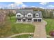 Two-story house, two-car garage, and nicely landscaped yard at 1741 Fair Glen Ct, Greenfield, IN 46140