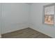 A bright bedroom with a window and light-colored floors at 3111 Station St, Indianapolis, IN 46218