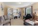 Inviting home office featuring built-in shelves, an electric fireplace, and a comfortable seating area at 3335 Hurst St, Whiteland, IN 46184