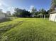 Expansive backyard with ample green space, offering a private outdoor retreat at 712 Lonsvale Dr, Anderson, IN 46013