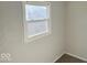 Bedroom with a window, neutral walls, and carpet at 712 Lonsvale Dr, Anderson, IN 46013