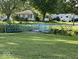 Quaint home near a blue bridge, surrounded by lush greenery at 712 Lonsvale Dr, Anderson, IN 46013
