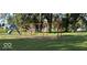 Community playground featuring swings and a slide, perfect for Gathering fun at 712 Lonsvale Dr, Anderson, IN 46013