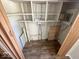 Utility storage room or closet with shelves and plumbing at 712 Lonsvale Dr, Anderson, IN 46013