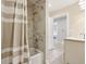 Bathroom with shower/tub and striped curtain at 140 W 44Th St, Indianapolis, IN 46208