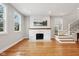 Spacious living room with hardwood floors and fireplace at 140 W 44Th St, Indianapolis, IN 46208