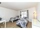 Comfortable bedroom featuring two beds with stylish black and white bedding, and a bright window at 14626 Warner Trl, Westfield, IN 46074