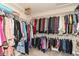 Walk-in closet featuring carpet flooring, and metal bars and shelves for ample clothing storage at 14626 Warner Trl, Westfield, IN 46074