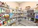 Organized pantry with wire shelving stocked with various food items and storage baskets at 14626 Warner Trl, Westfield, IN 46074