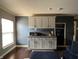 Well-organized kitchenette featuring matching cabinets, a counter and essential appliances at 5656 Buck Dr, Noblesville, IN 46062