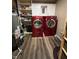 The laundry room showcases modern appliances and lots of cabinet space at 5656 Buck Dr, Noblesville, IN 46062