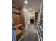Practical mud room with a storage bench and coat rack, along with a built-in vanity for added convenience at 5656 Buck Dr, Noblesville, IN 46062