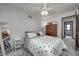 Comfortable bedroom features a chest of drawers and a bed with a patterned bedspread at 1487 Brook Mill Ct, Carmel, IN 46032
