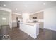 Modern kitchen featuring stainless steel appliances and an island at 1420 Chime Ln, Greenwood, IN 46143