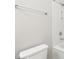 Clean bathroom features a white toilet and a shower/tub with white surround at 350 N Meridian St # 901, Indianapolis, IN 46204