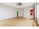 Bright bedroom with hardwood floors and view to living room at 350 N Meridian St # 901, Indianapolis, IN 46204