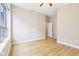 Well lit bedroom with a large window and hardwood floors at 350 N Meridian St # 901, Indianapolis, IN 46204