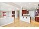 Spacious open-concept kitchen and living area with sleek countertops and hardwood flooring at 350 N Meridian St # 901, Indianapolis, IN 46204