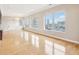 Light-filled living area showcases hardwood floors, large windows and beautiful city views at 350 N Meridian St # 901, Indianapolis, IN 46204