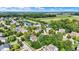 Neighborhood view, showcasing a two-story house near a pond at 11419 Romeo Pl, Fishers, IN 46040
