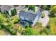 Two-story house with gray roof, deck, and landscaped backyard at 11419 Romeo Pl, Fishers, IN 46040