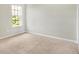 Empty bedroom with neutral walls and carpet flooring at 11419 Romeo Pl, Fishers, IN 46040