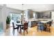 Kitchen features a dining area with a round table and four chairs at 11419 Romeo Pl, Fishers, IN 46040