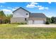 Large two-car garage and backyard view of a beautiful house at 11419 Romeo Pl, Fishers, IN 46040