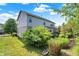 Side view of house showcasing brick and siding at 11419 Romeo Pl, Fishers, IN 46040